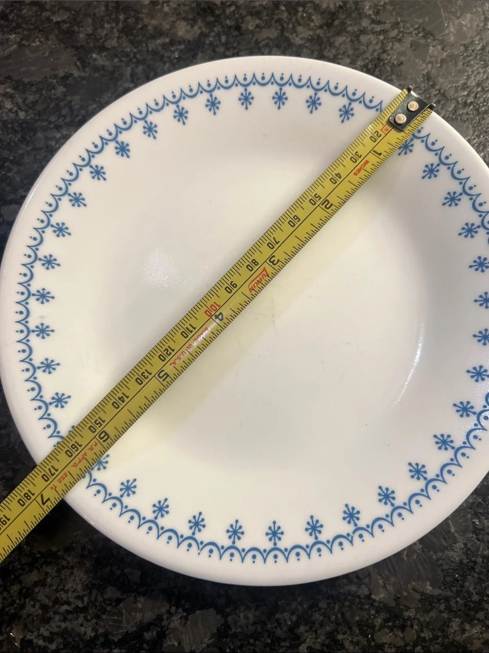4 piece set of Corelle Dinner plates and salad plates. Snowflake Blue